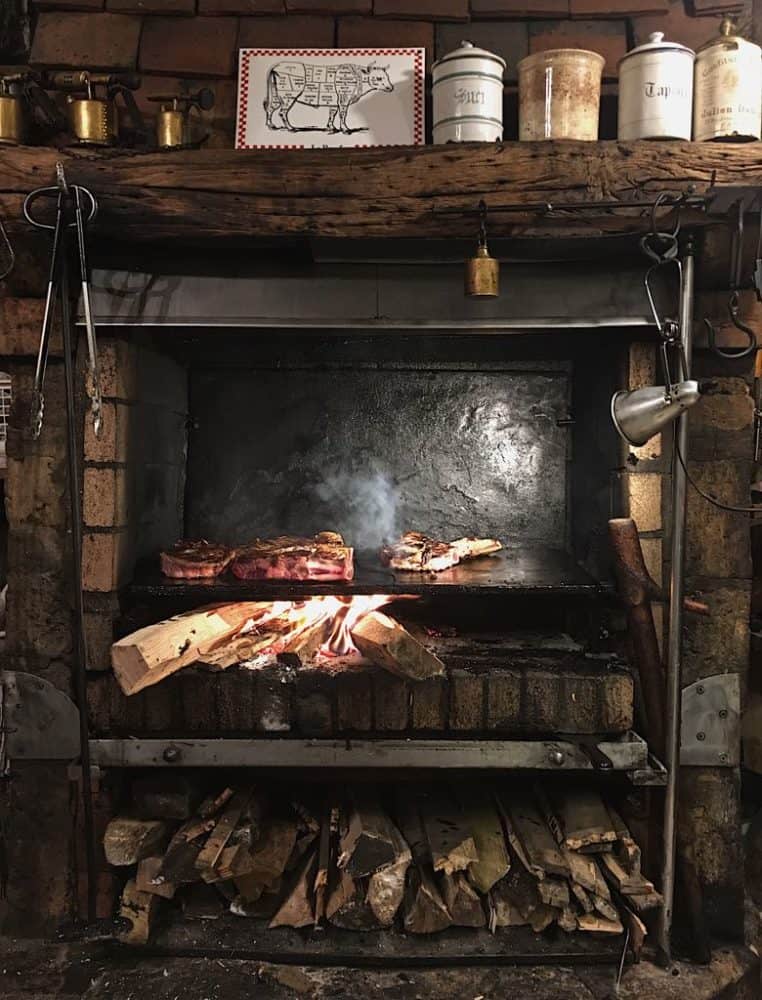 A review of Robert et Louise in the Marais, Paris, where steaks are cooked in the fireplace. #paris #restaurants #fromtheyums