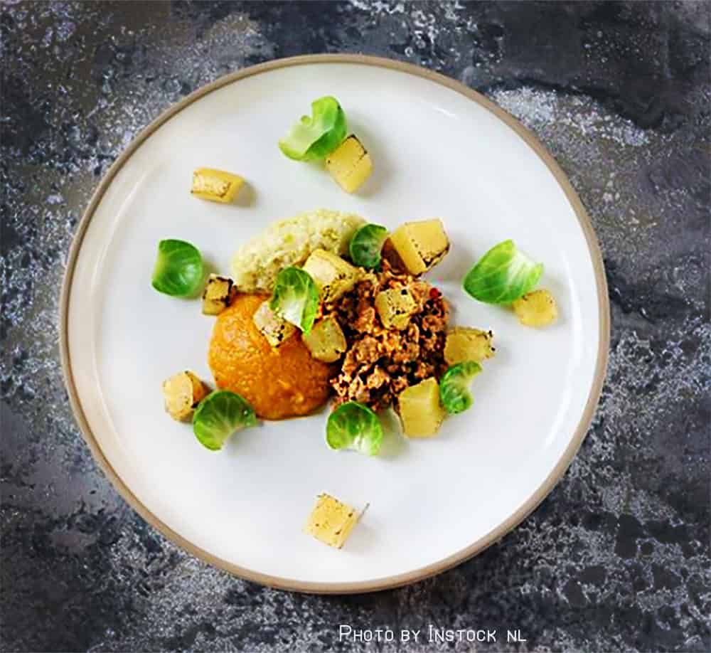 Instocks version of Nduja, made from sausage with a sauce of fermented chilil peppers, pumpkin puree and sprout pesto.