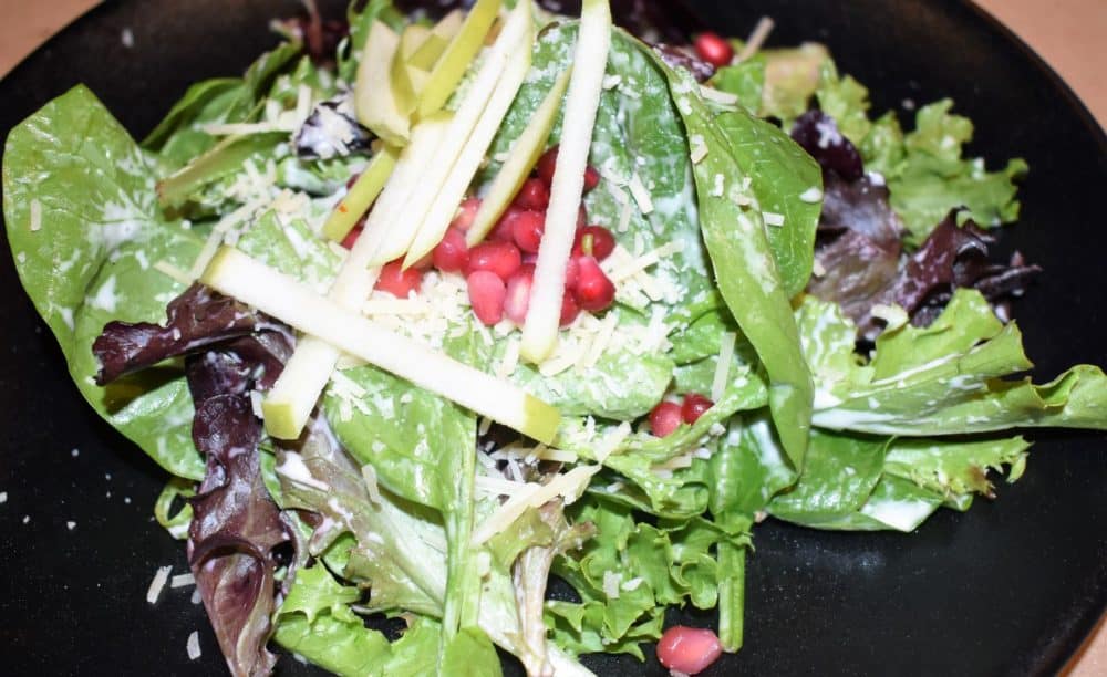 The greens and apple starter salad at Logan Tavern in Washington, DC is fresh and crisp.