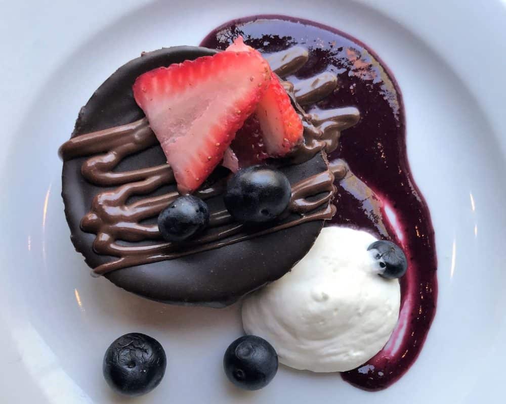 Flourless Chocolate Cake with Fruit Compote at Gamlin Whiskey House in St. Louis, Missouri