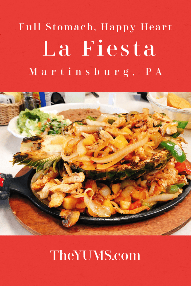 Fajitas Tropicales at La Fiesta Restaurant, Martinsburg, PA. Zesty grilled chicken, green peppers, pineapple, onions, and tomatoes served in a half pineapple with lettuce, refried beans, guacamole, and Pico De Gallo on the side and 3 soft flour tortilla shells. Read the review.