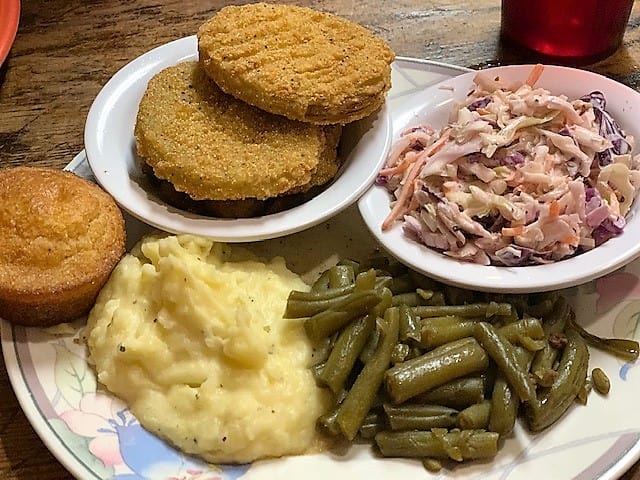 Vegetable plate featuring fried green tomatoes at Cahoots Cafe in Hartselle, Alabama