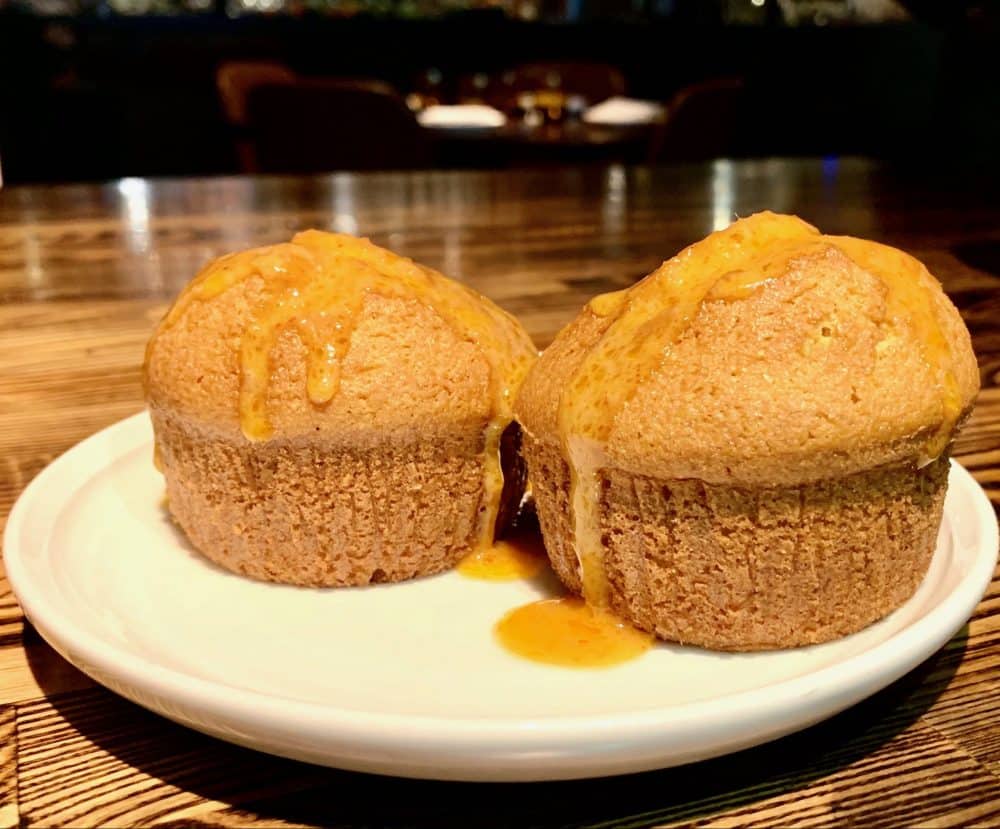 Cornbread topped with red curry butter.