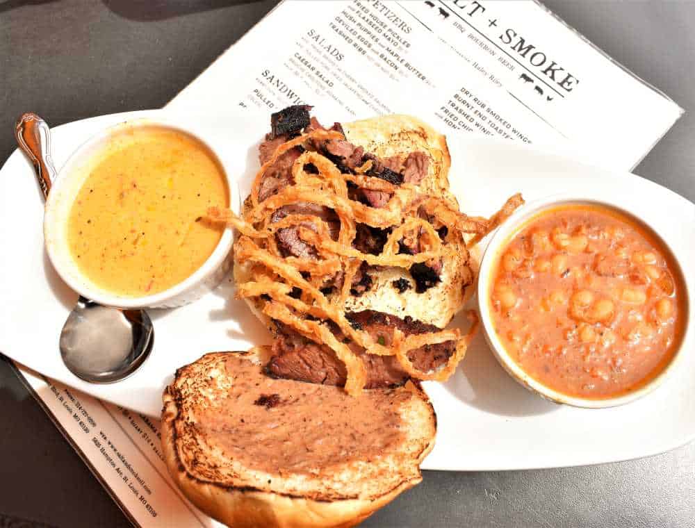 Lunch at Salt + Smoke includes a brisket sandwich and pit beans
